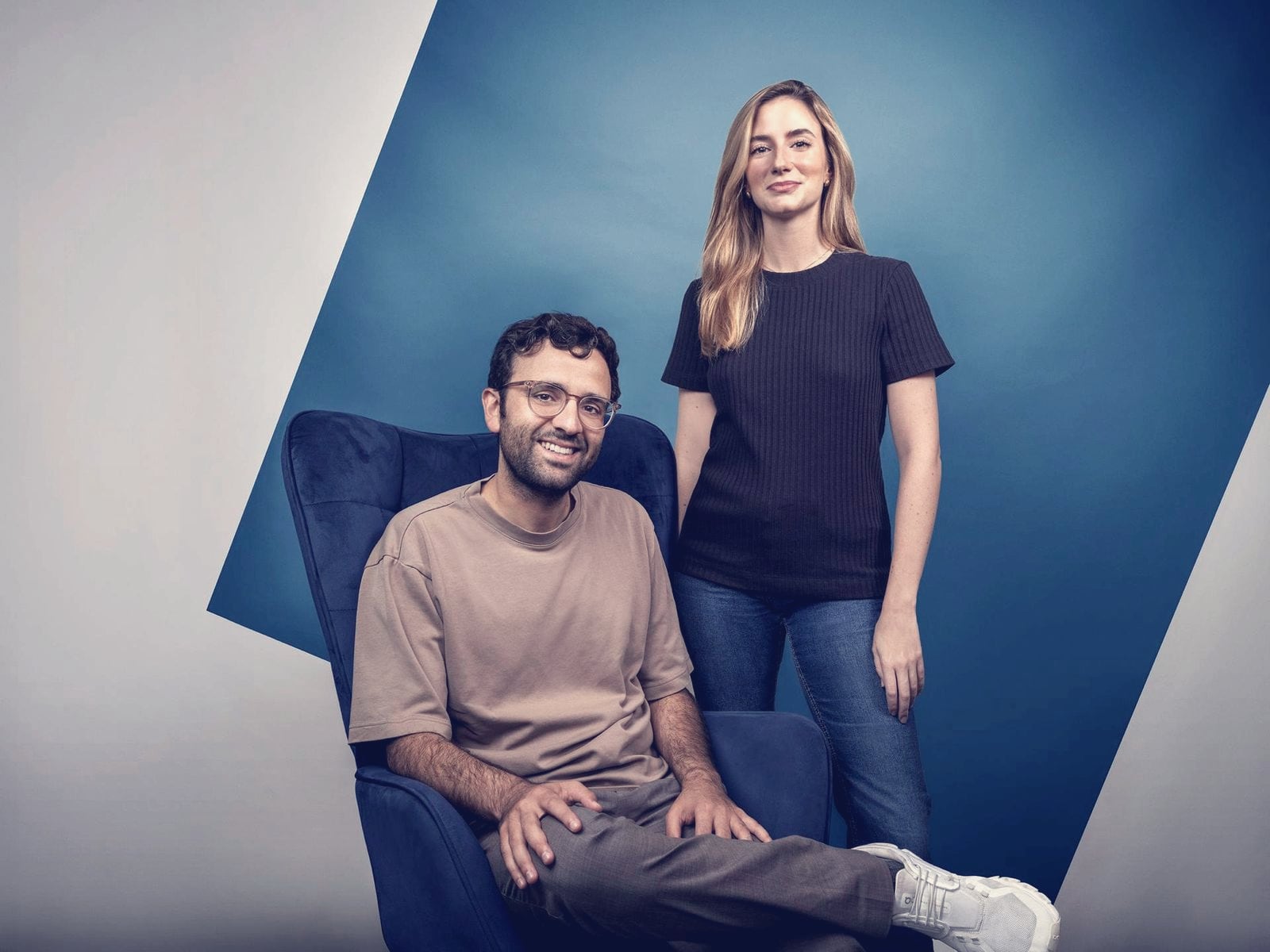 Kalshi co-founders Tarek Mansour (seated) and Luana Lopes Lara in a studio portrait