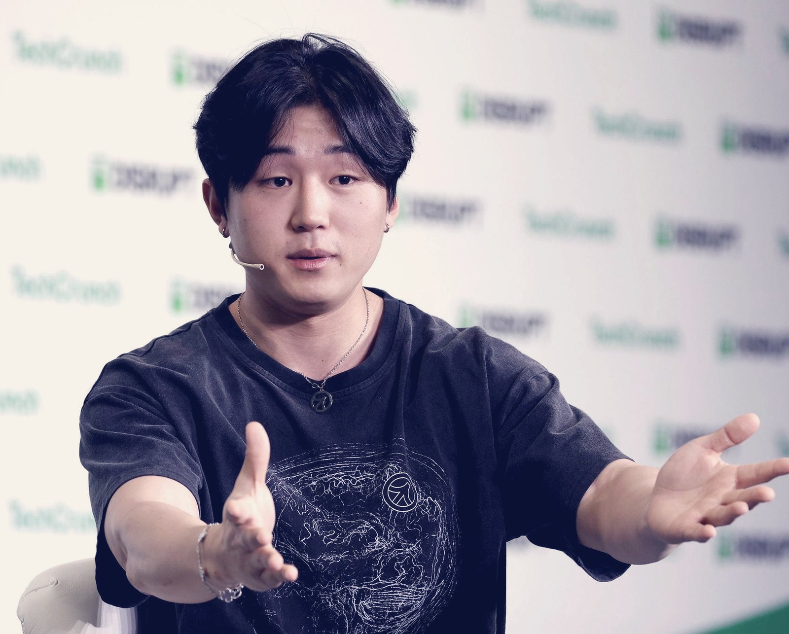 Roy Lee, Cluely cofounder and CEO, gesturing on stage at TechCrunch Disrupt 2025